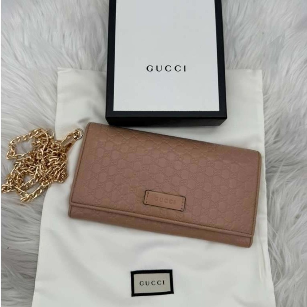 Gucci Beige GG Embossed Leather Wallet